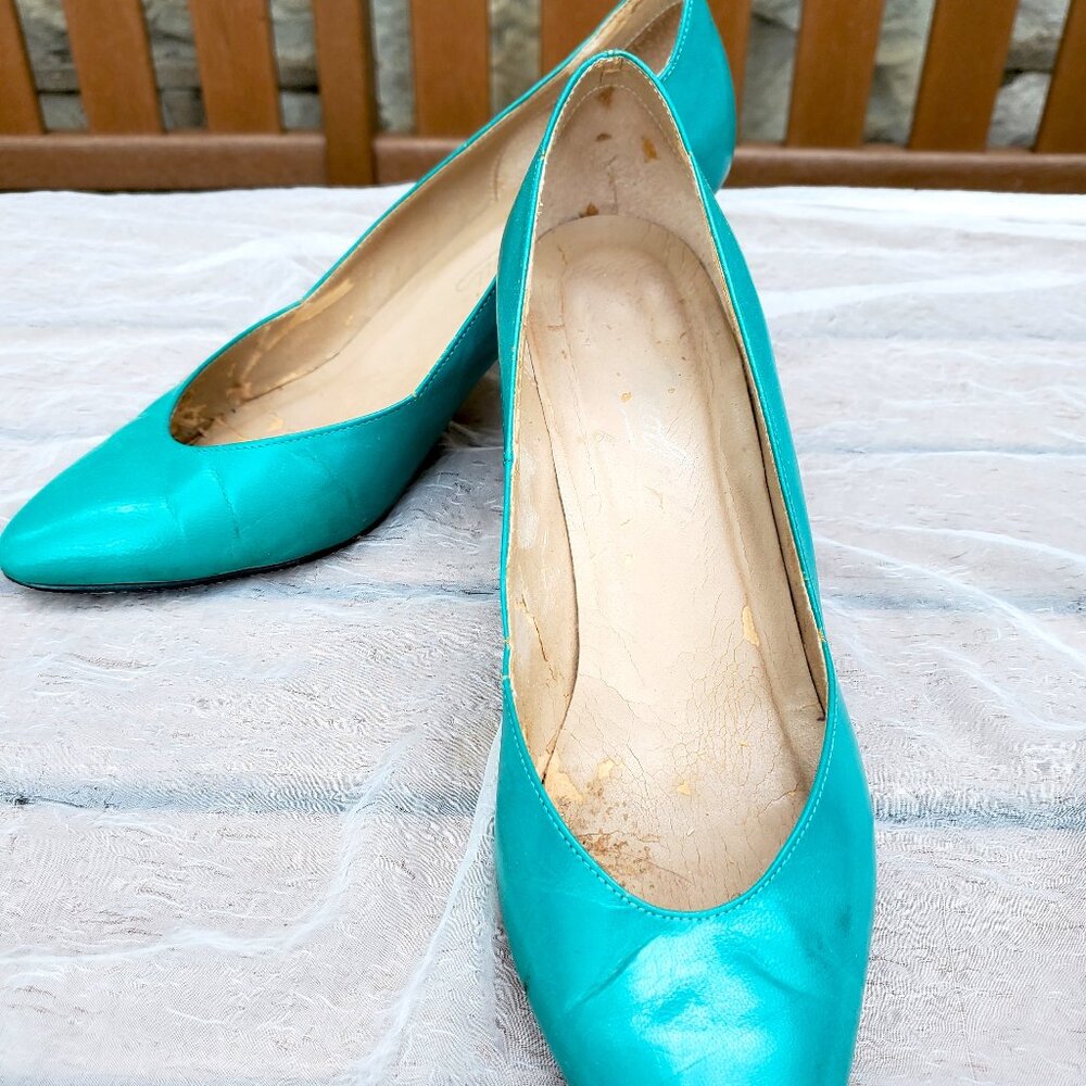 Bright teal pumps